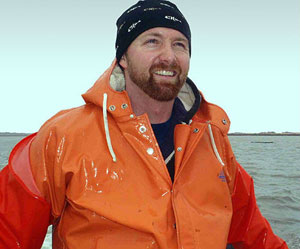 man smiling ocean background cape cod island