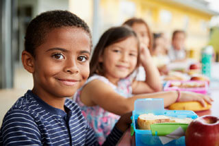 photo kids smiling having meals cape cod
