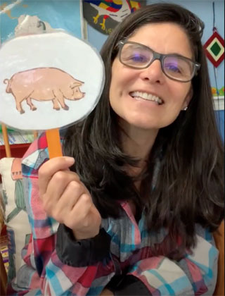 woman showing pig picture smiling cape cod island