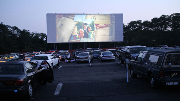 drive-in theater surrounded cars night time cape cod island