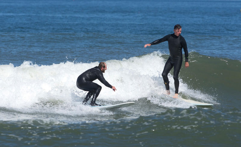 two person surfing cape cod island