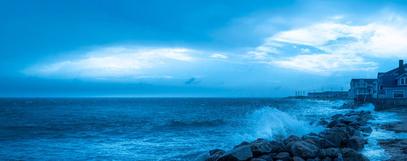 big rocks blue ocean waves impact cape cod island