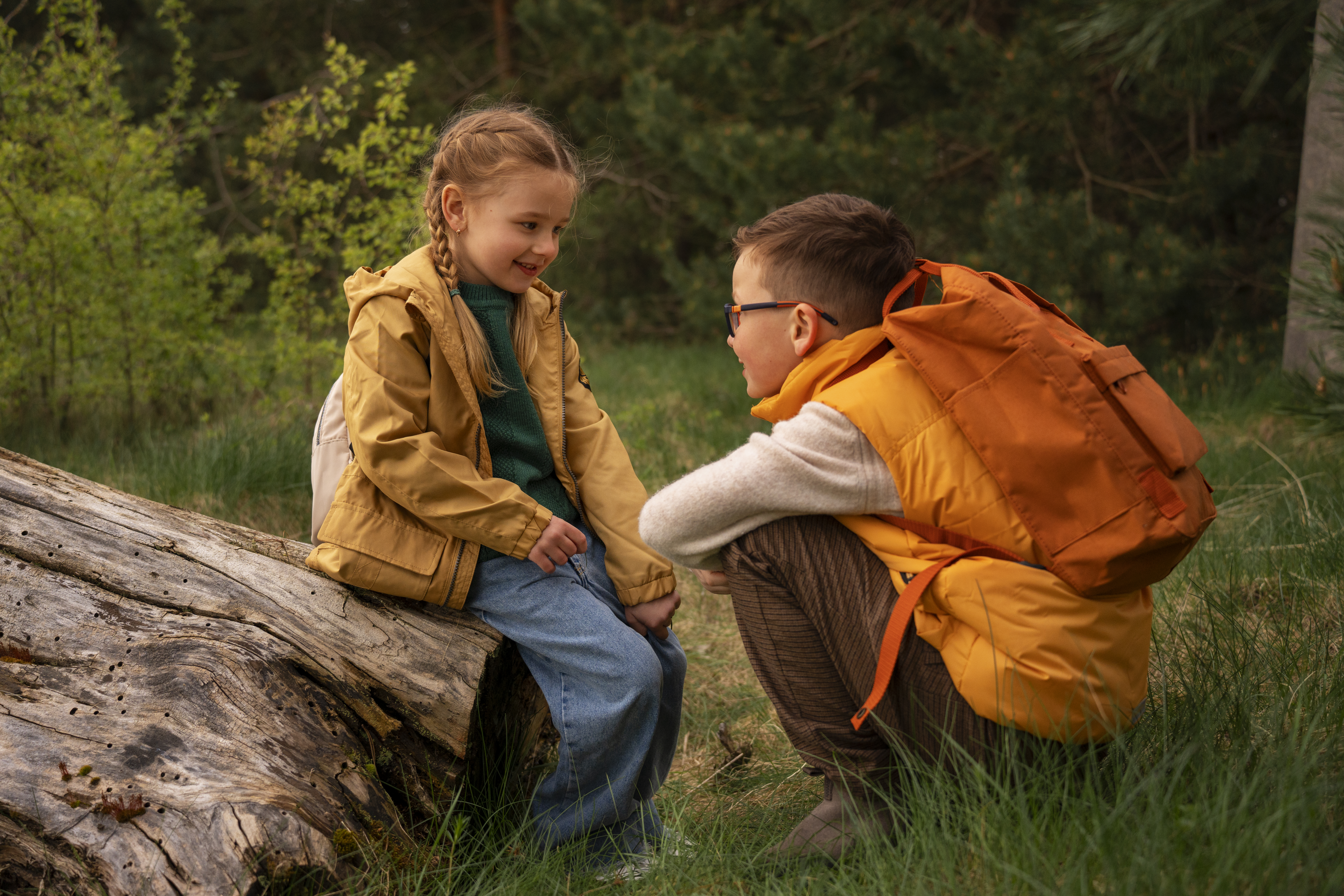 view little kids with backpacks spending time nature outdoors