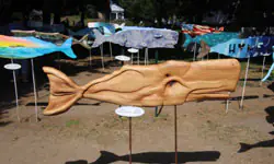 wooden carved whale display park cape cod island